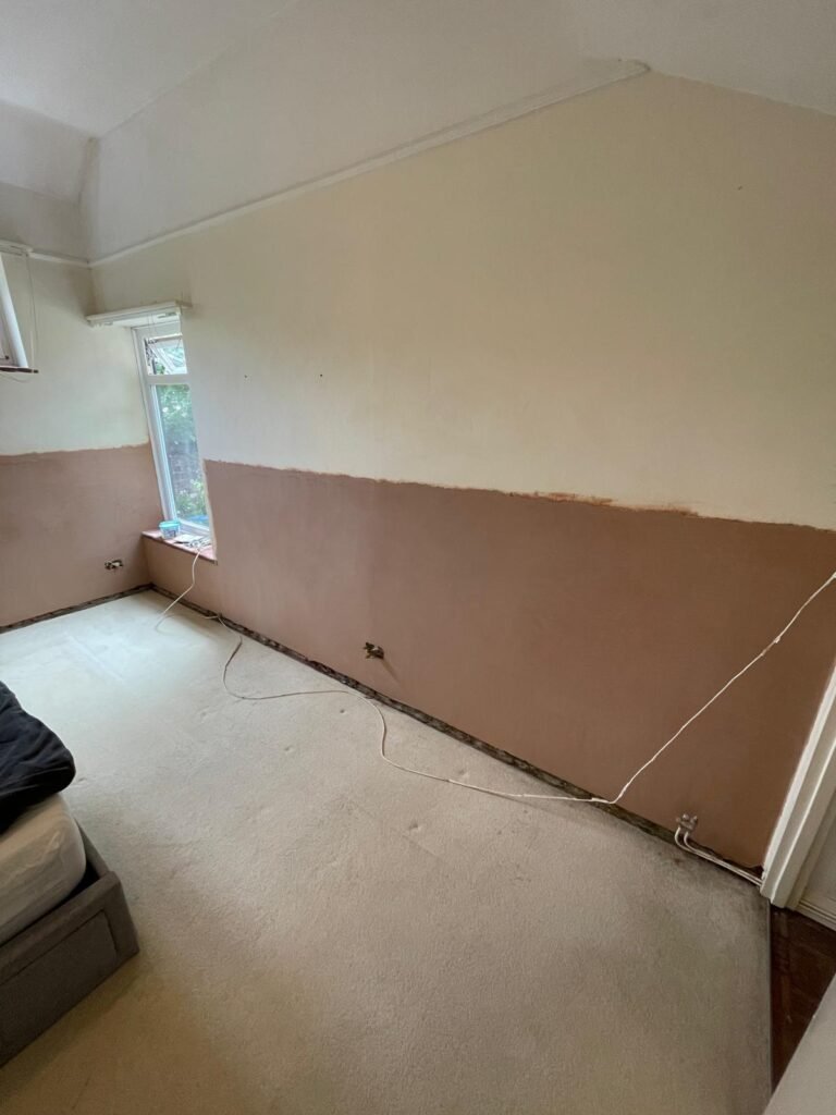 Bedroom after damp proofing treatment.